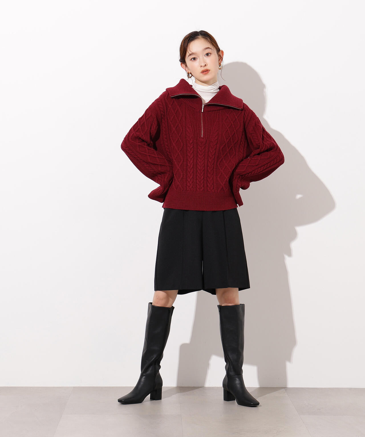 ハーフジップケーブルニット