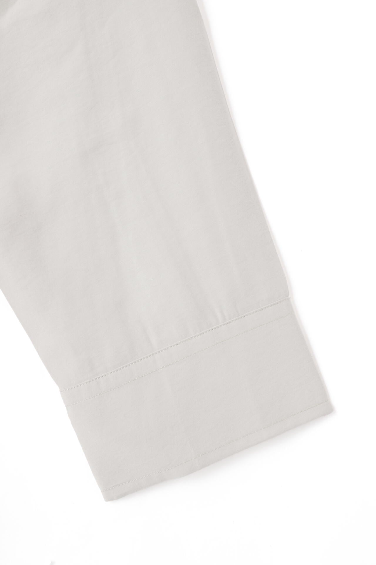 STUDIO NICHOLSON / MODAL HABOTAI ASSYMETRIC FOLD FRONT DRESS