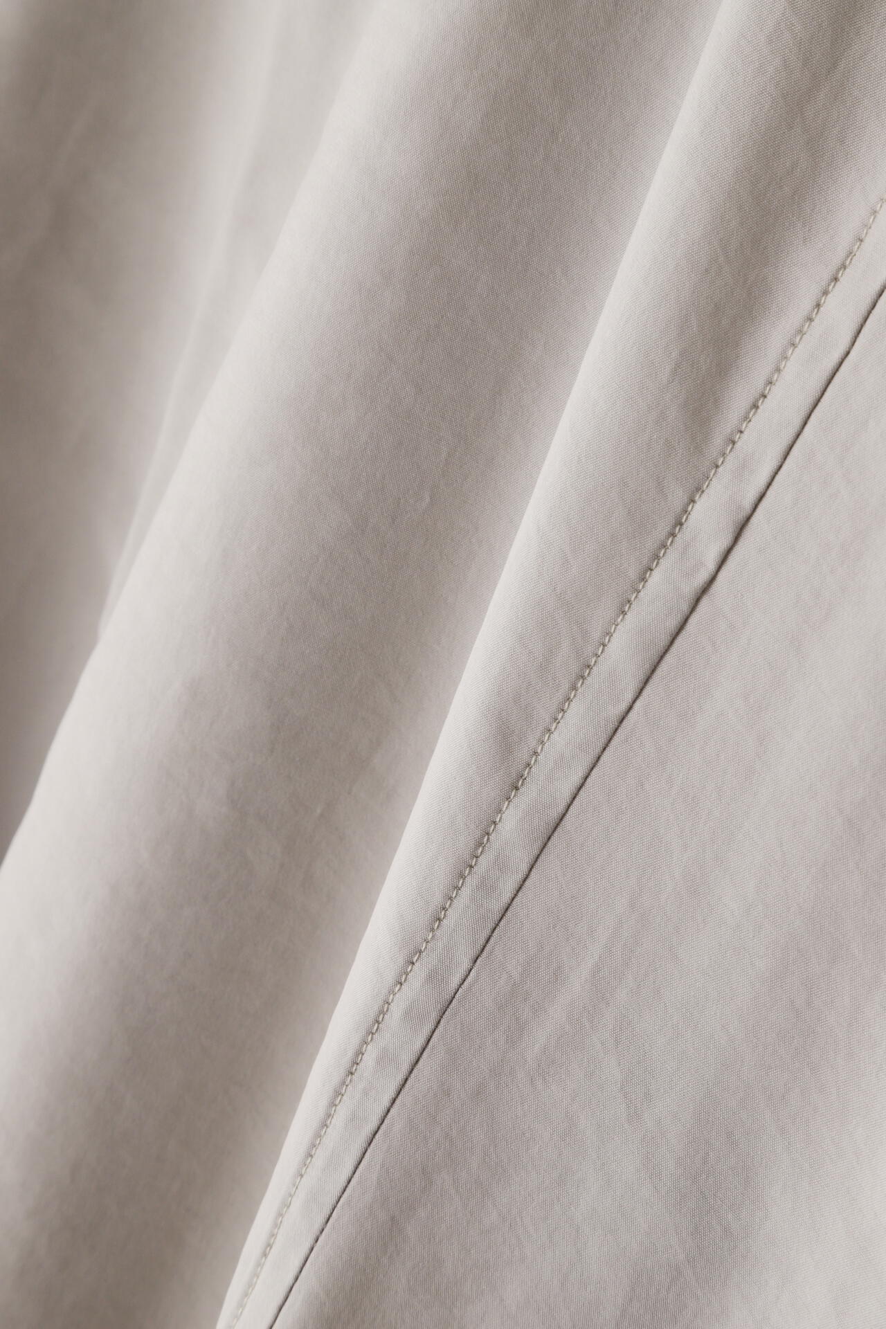 STUDIO NICHOLSON / MODAL HABOTAI ASSYMETRIC FOLD FRONT DRESS