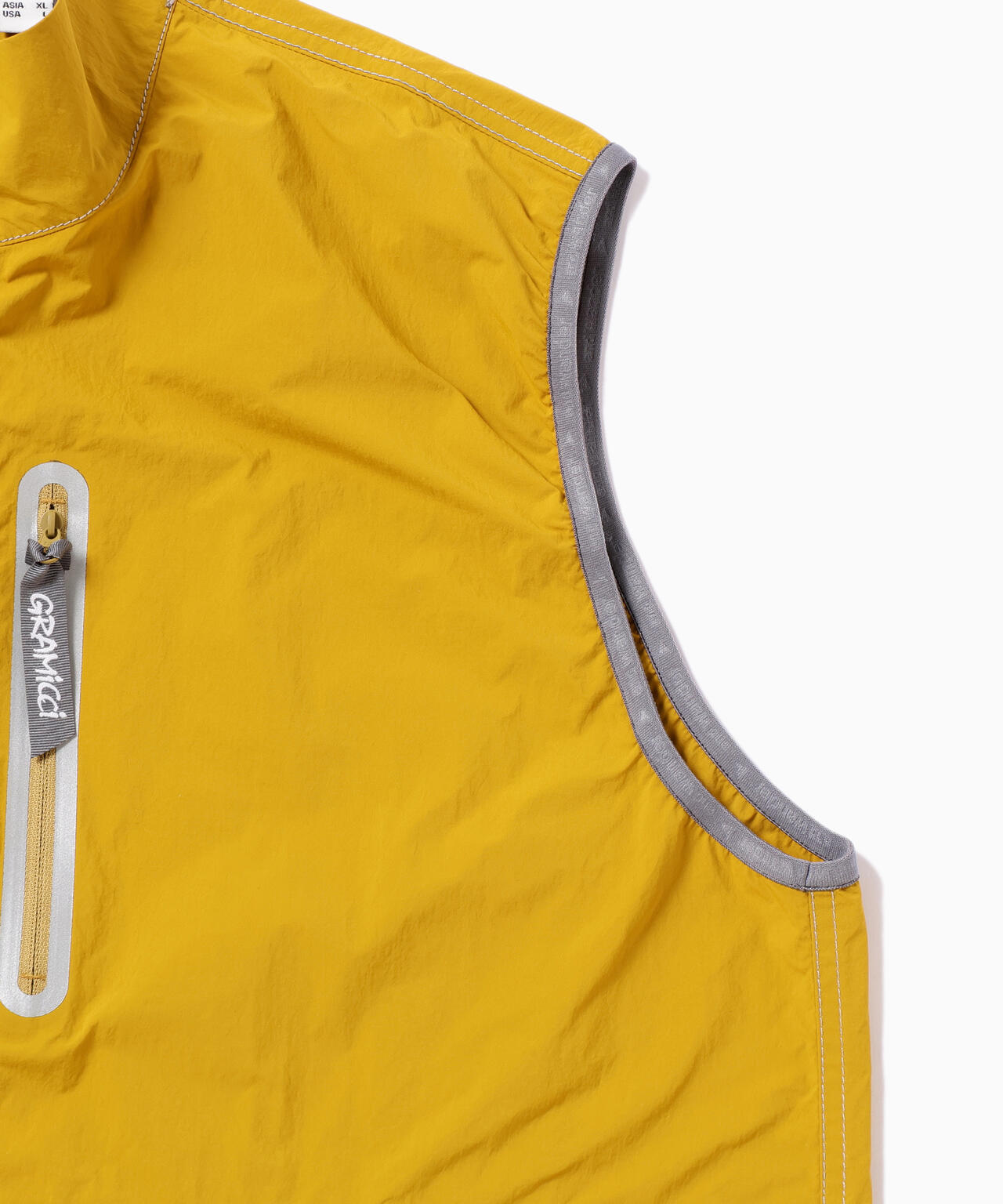 Gramicci × and wander brushed nylon vest