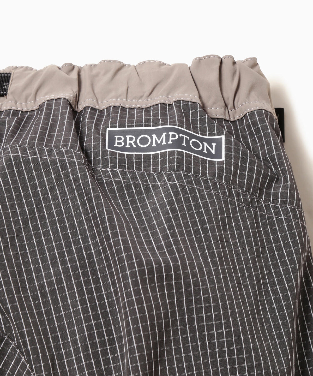 Brompton × reflective rip pants