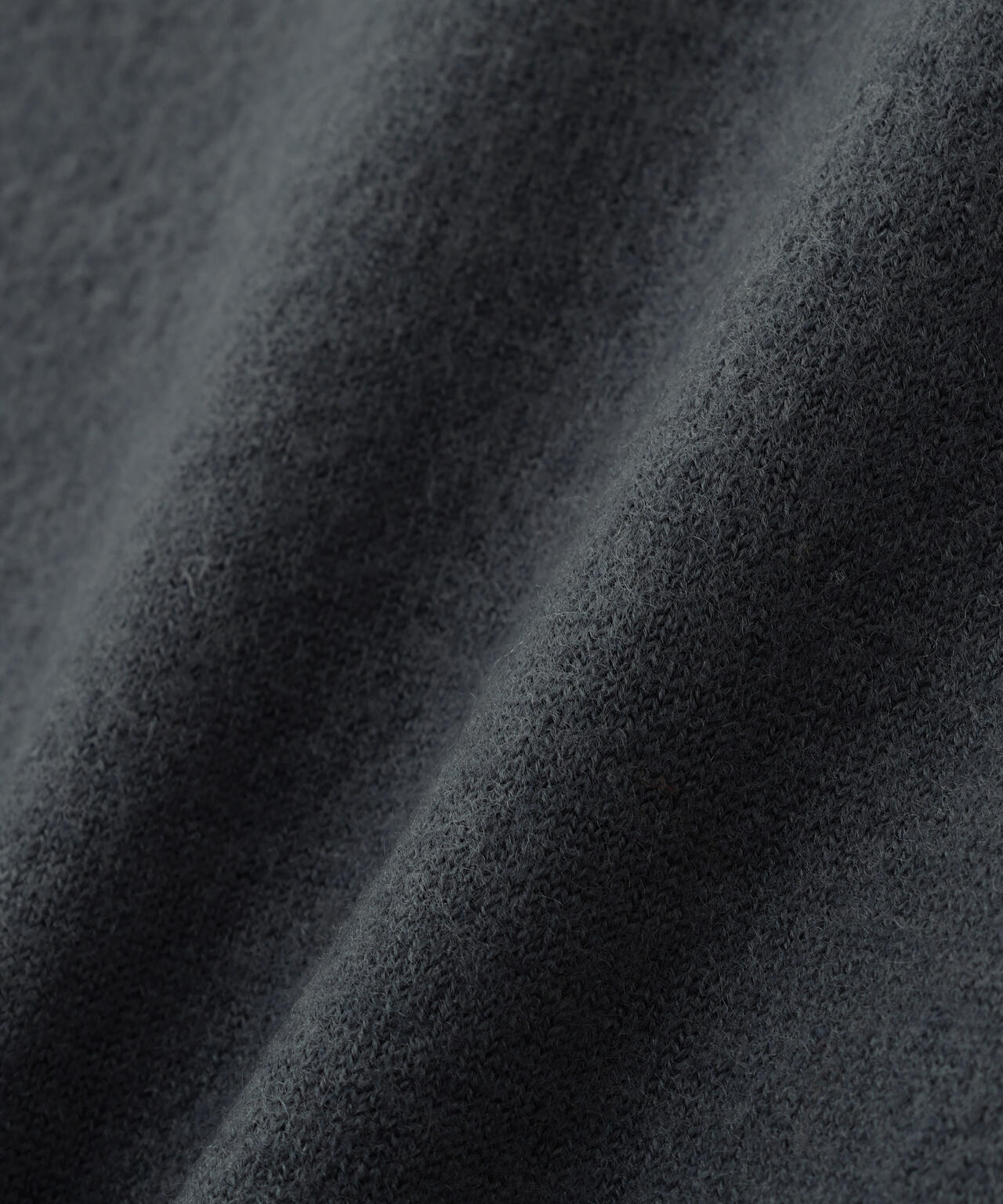 FELTED ROUGH WOOL KNITWEAR