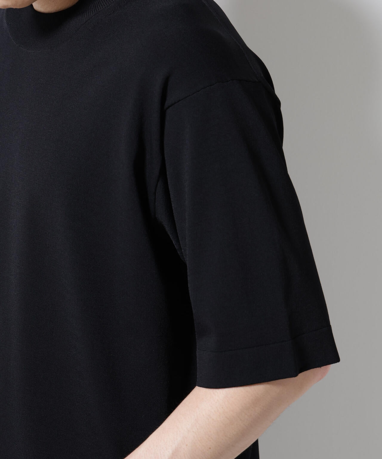 「ELITE 7 FUNCTION」モックネックニット