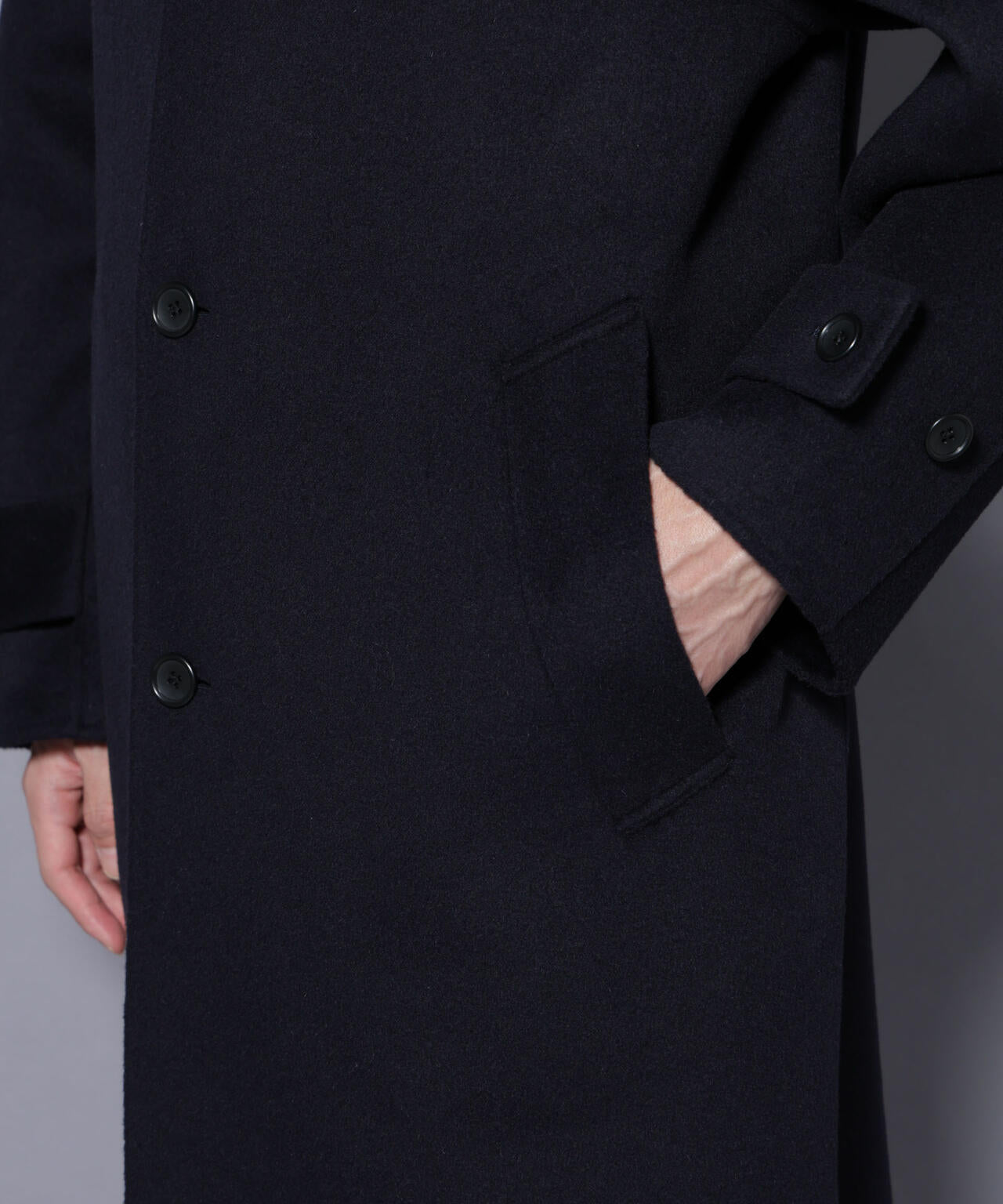 ウールリバースタンドベルテッドコート