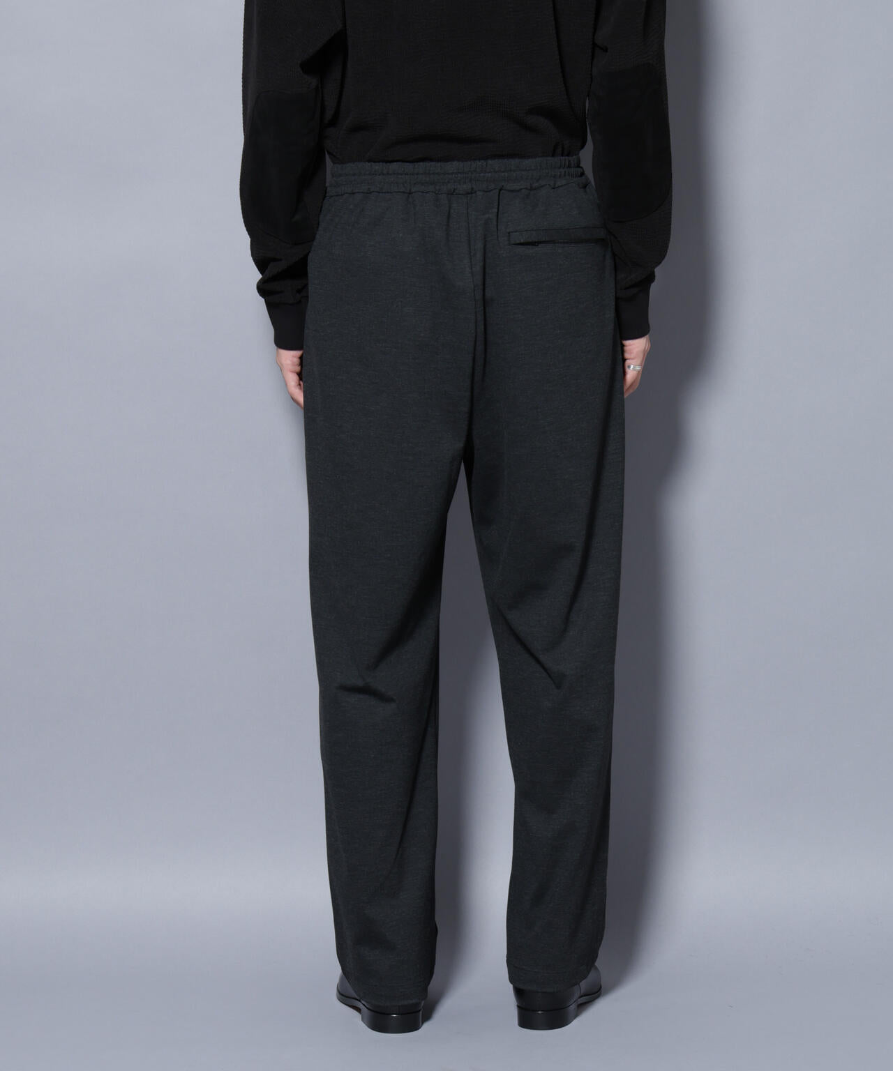 DELEGANTE TECH+ トラックパンツ