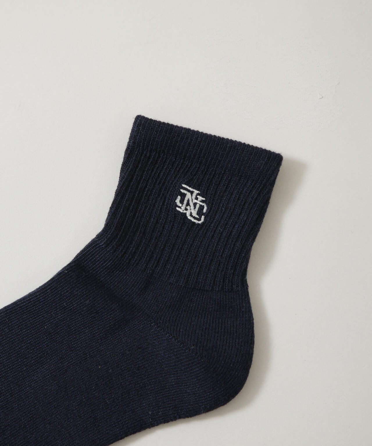 「NJ/CLUB」 クォーターリブロゴ刺繍ソックス