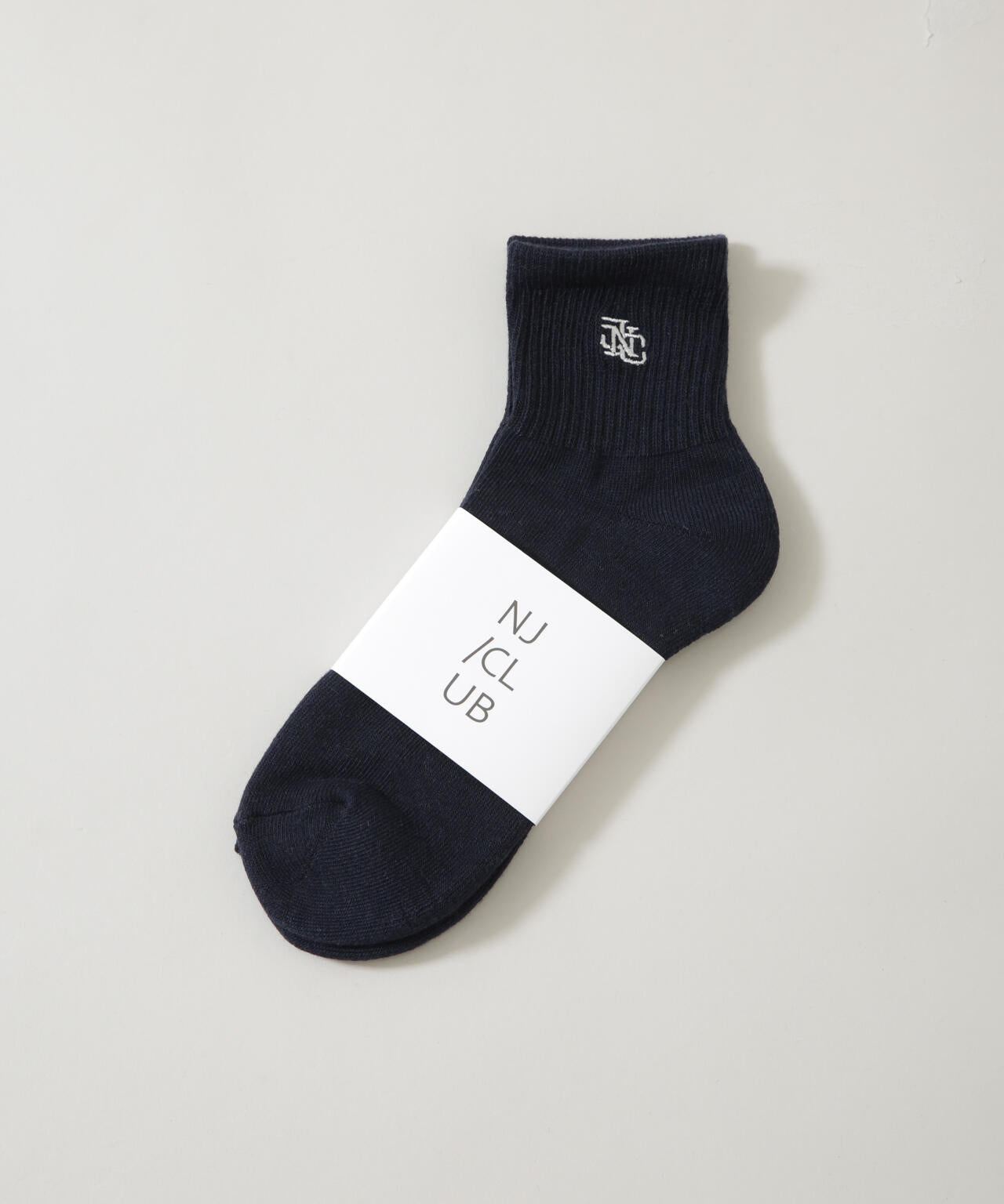 「NJ/CLUB」 クォーターリブロゴ刺繍ソックス