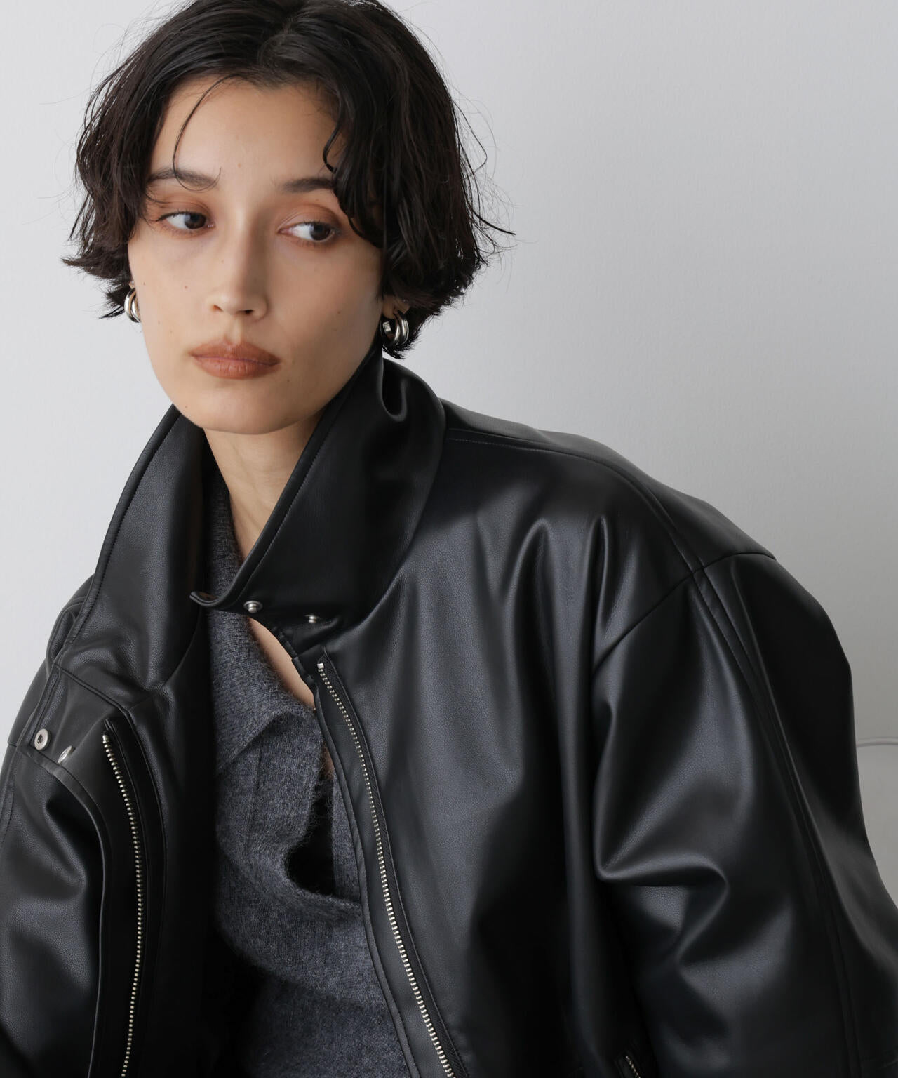 「STEVELOUR」スタンドフェイクレザージップブルゾン