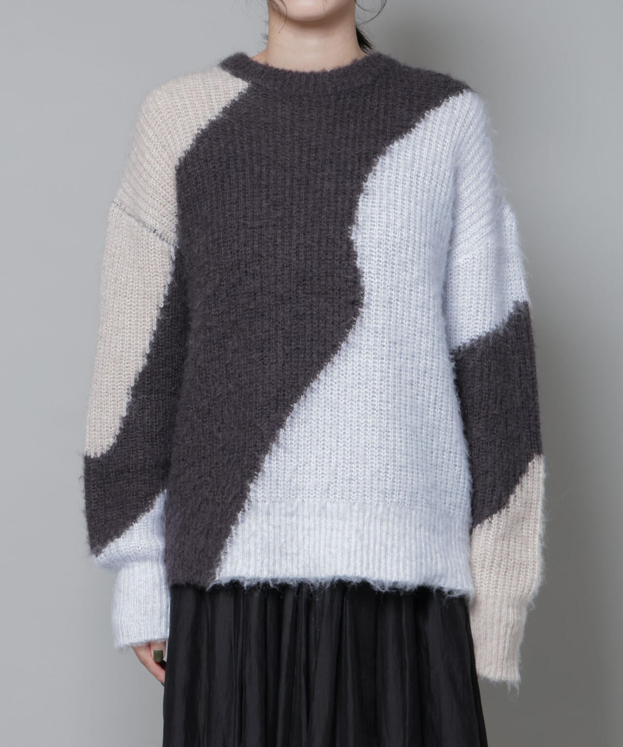 モヘヤ起毛カーブパターンブロッキングニット