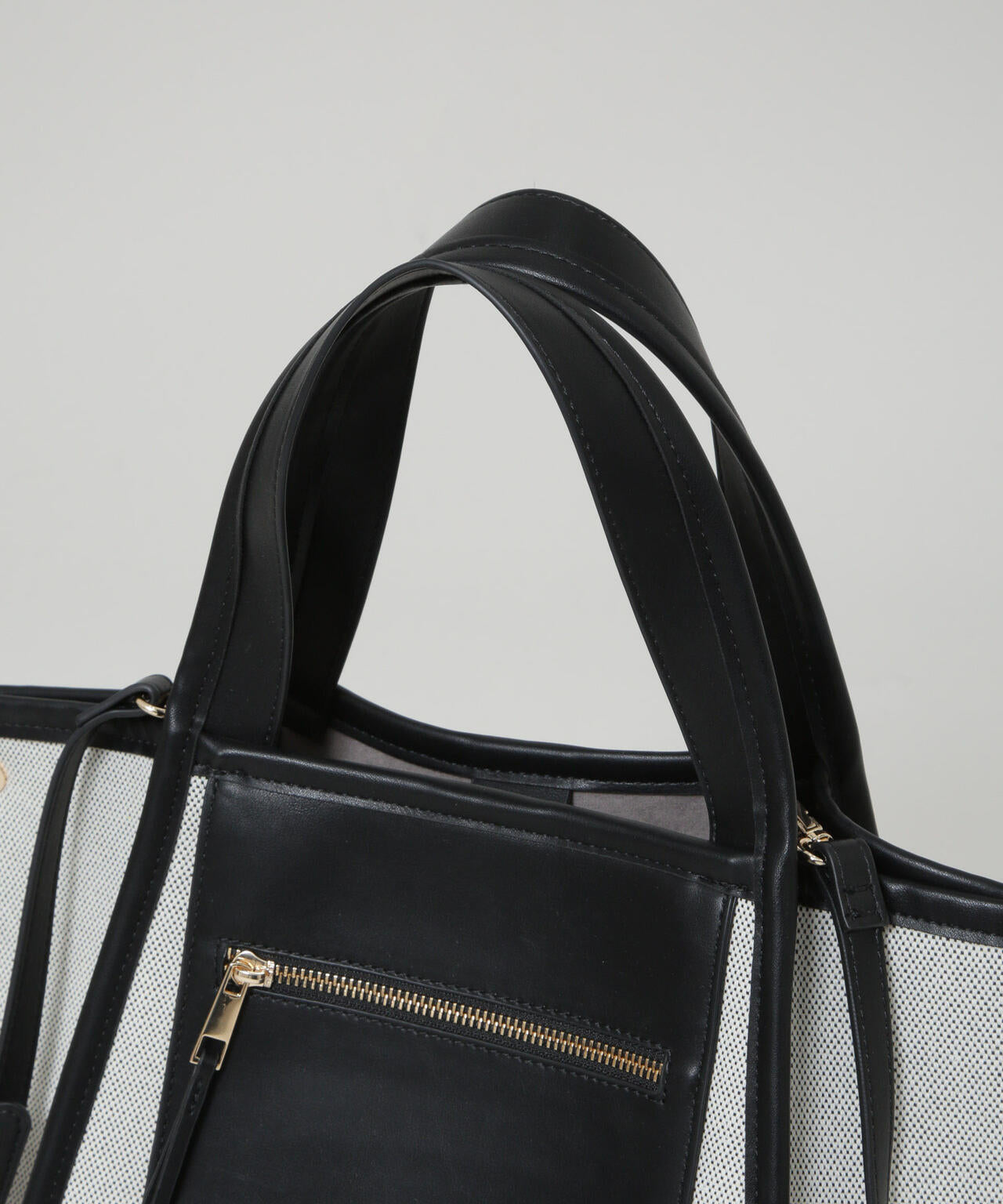 キャンバス×フェイクレザーポケットバッグ