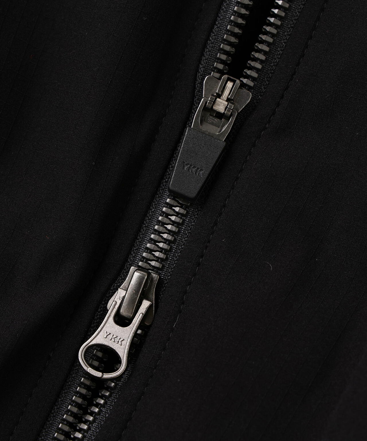 ストレッチリップストップ×高密度ツイル レイヤードブルゾン