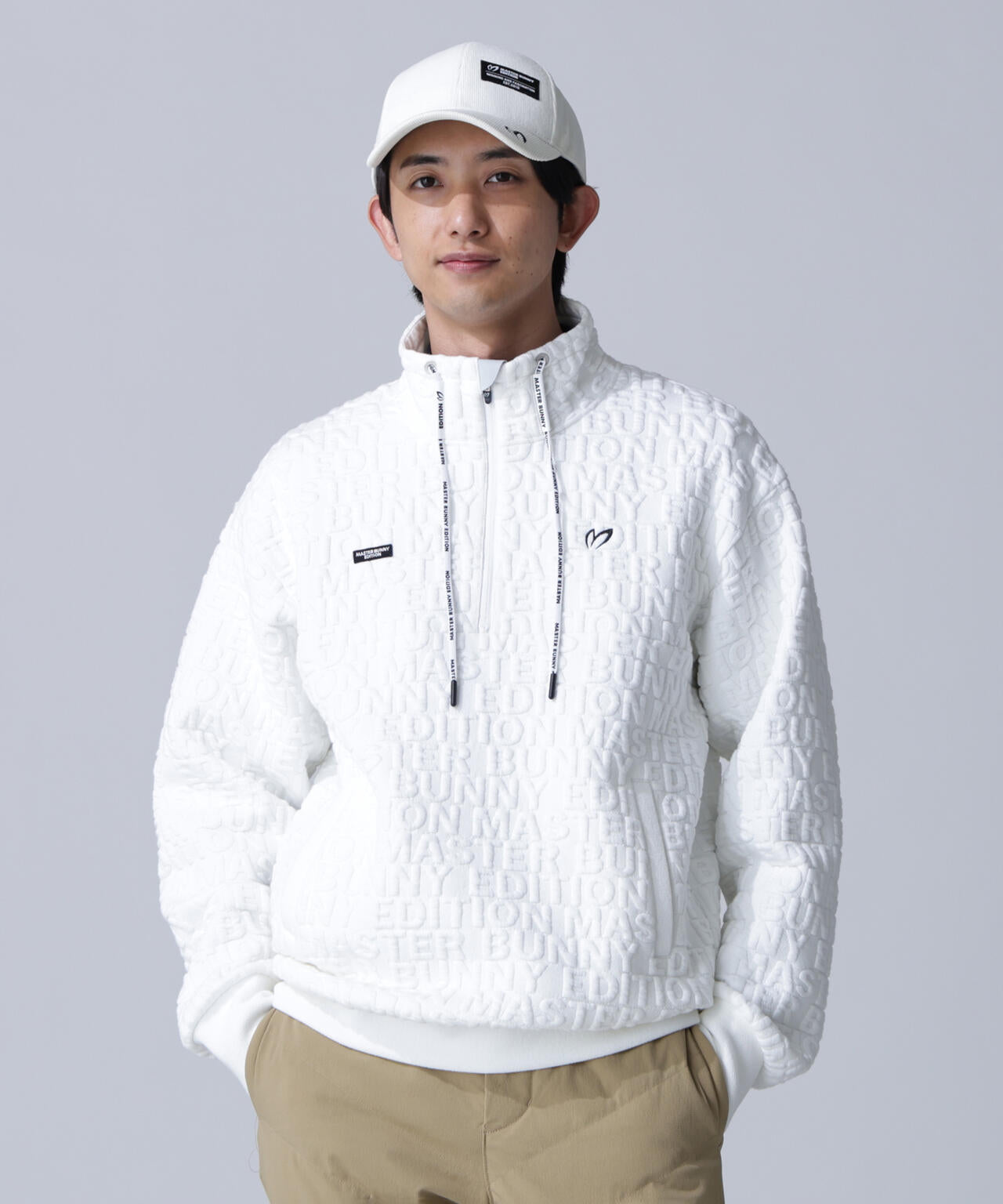 ロゴキルトジャガードハーフジップアップ