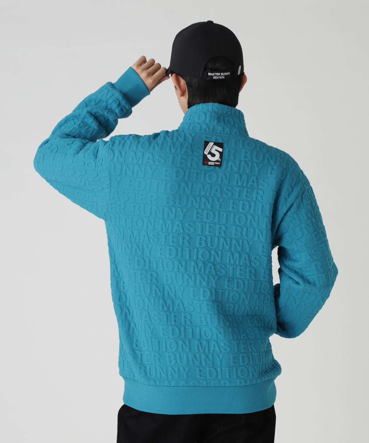 ロゴキルトジャガードハーフジップアップ