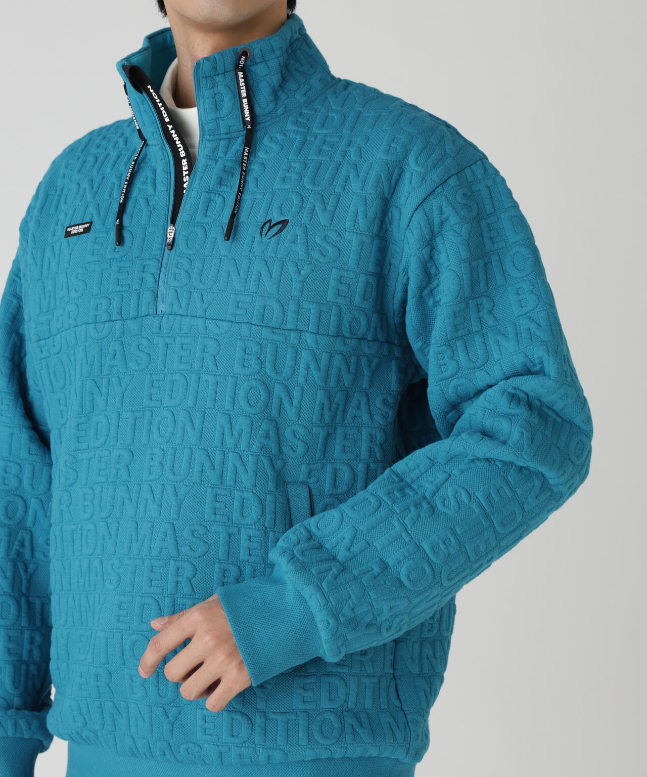 ロゴキルトジャガードハーフジップアップ