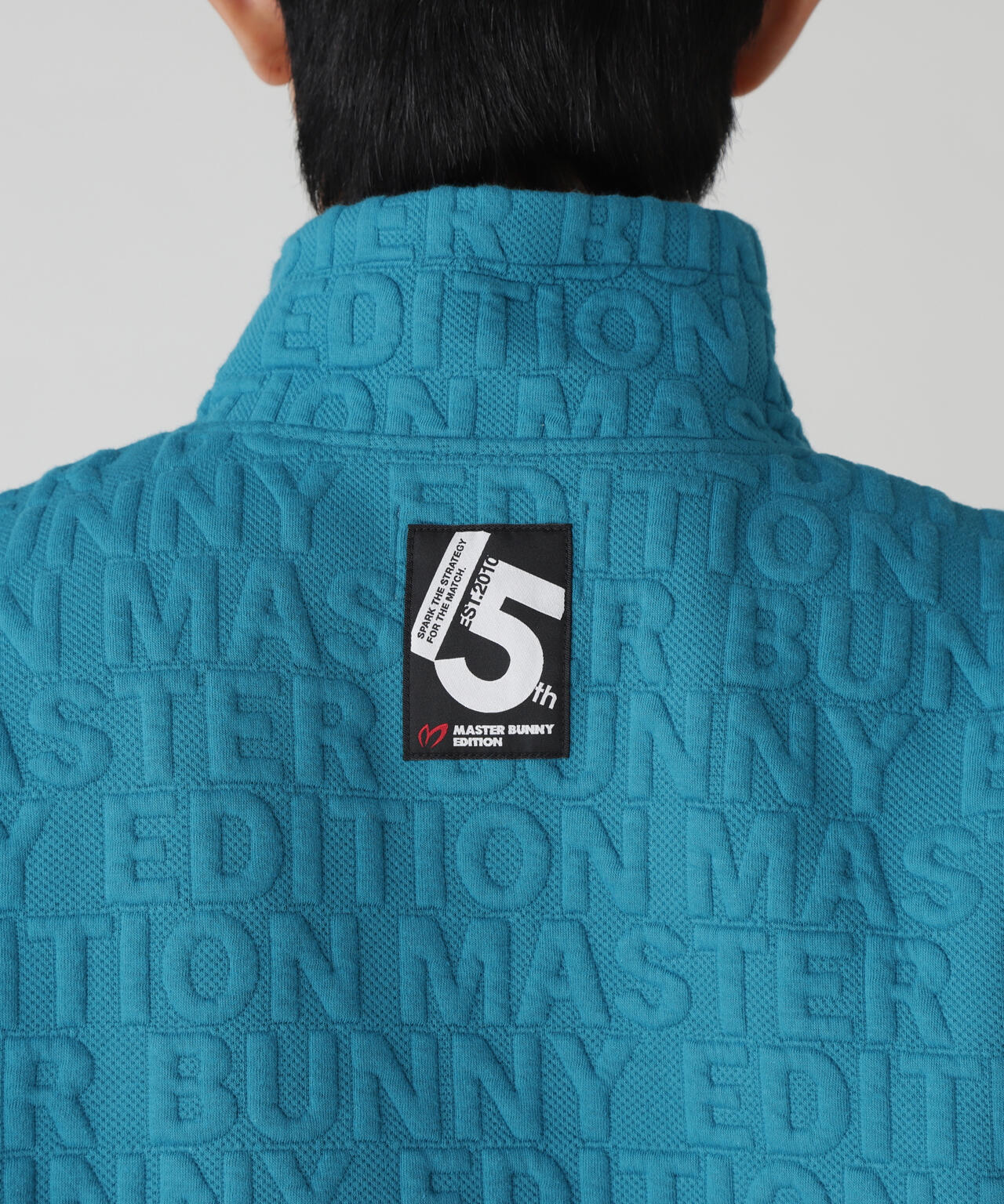 ロゴキルトジャガードハーフジップアップ