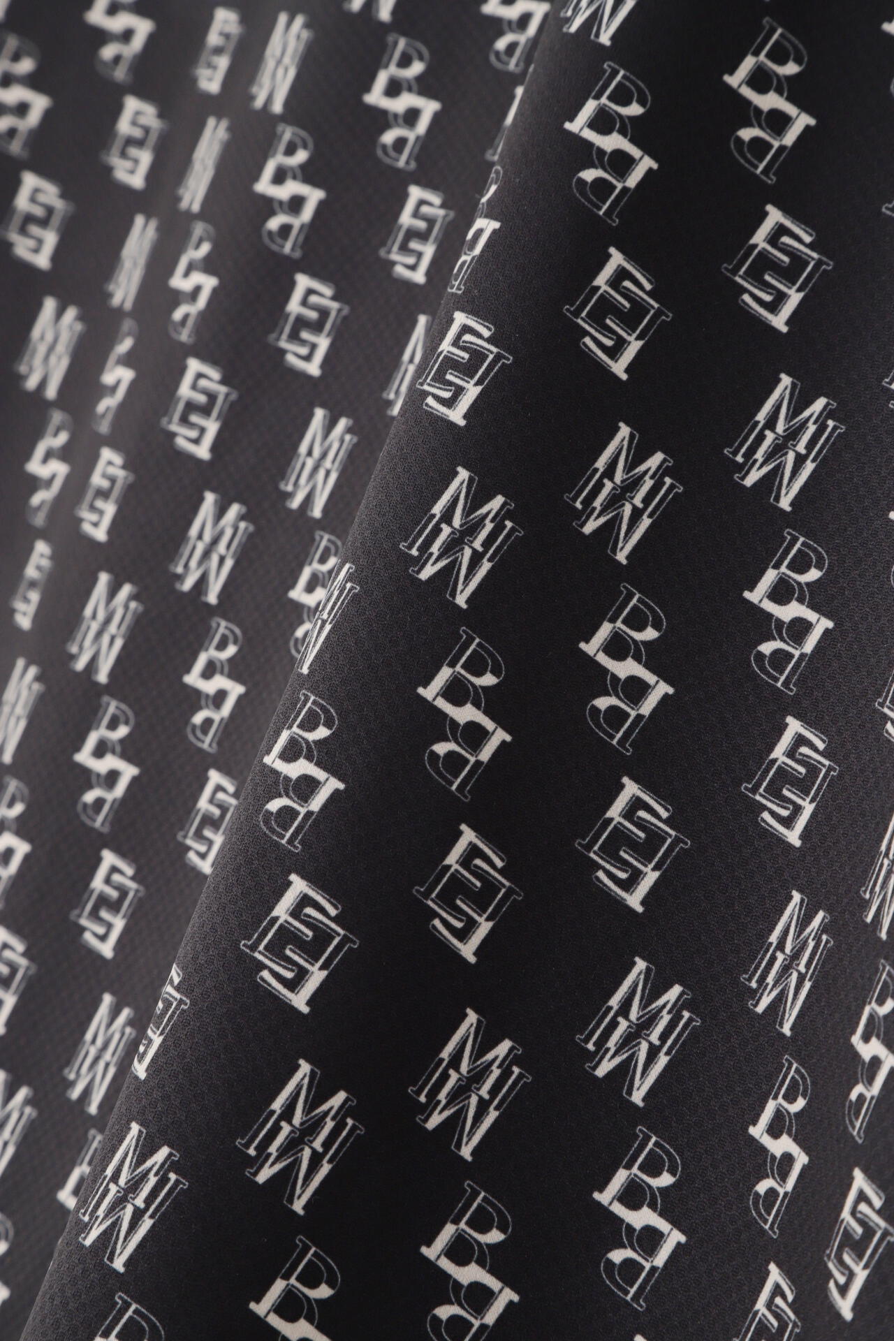 ポリエステルドビー 半袖ポロシャツ <MBEバイヤス柄プリント>