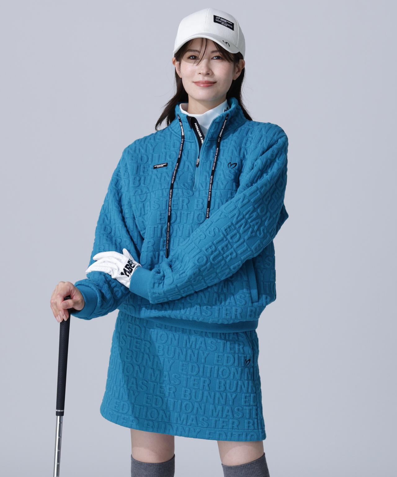 ロゴキルトジャガードハーフジップアップ