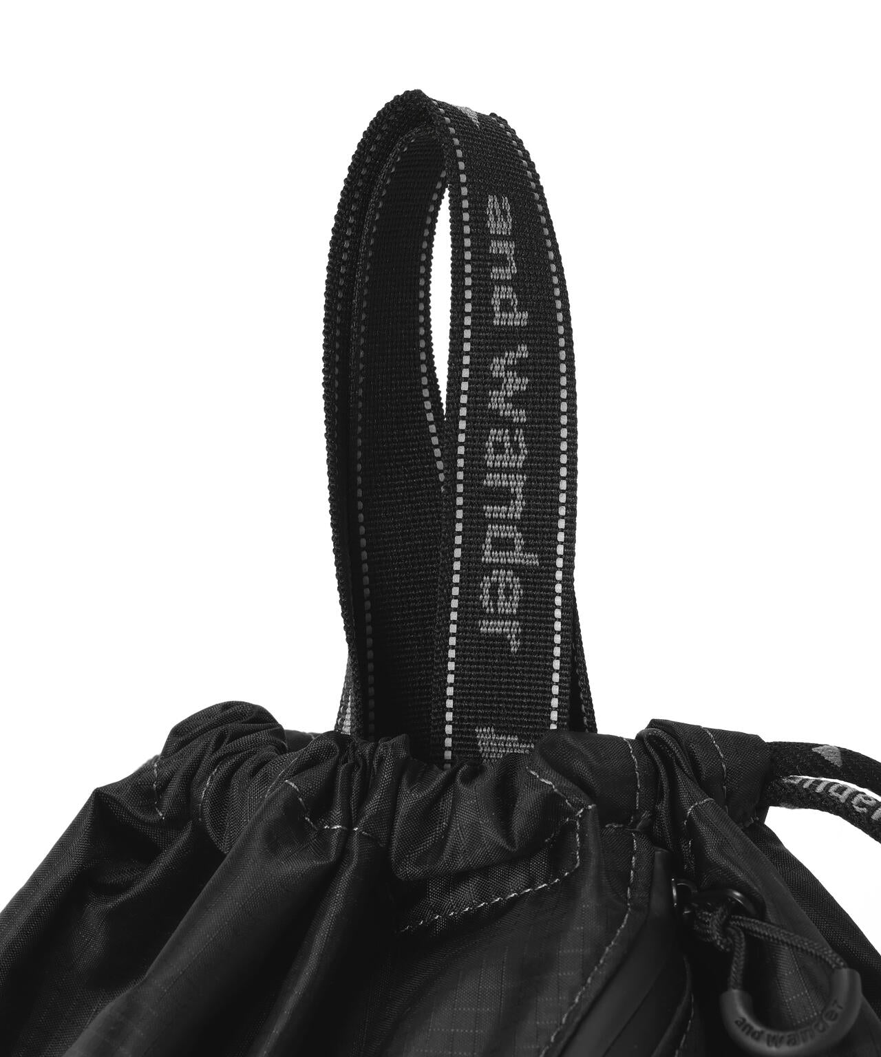 and wander/アンドワンダー crispy rip drawstrung bag ナップサック