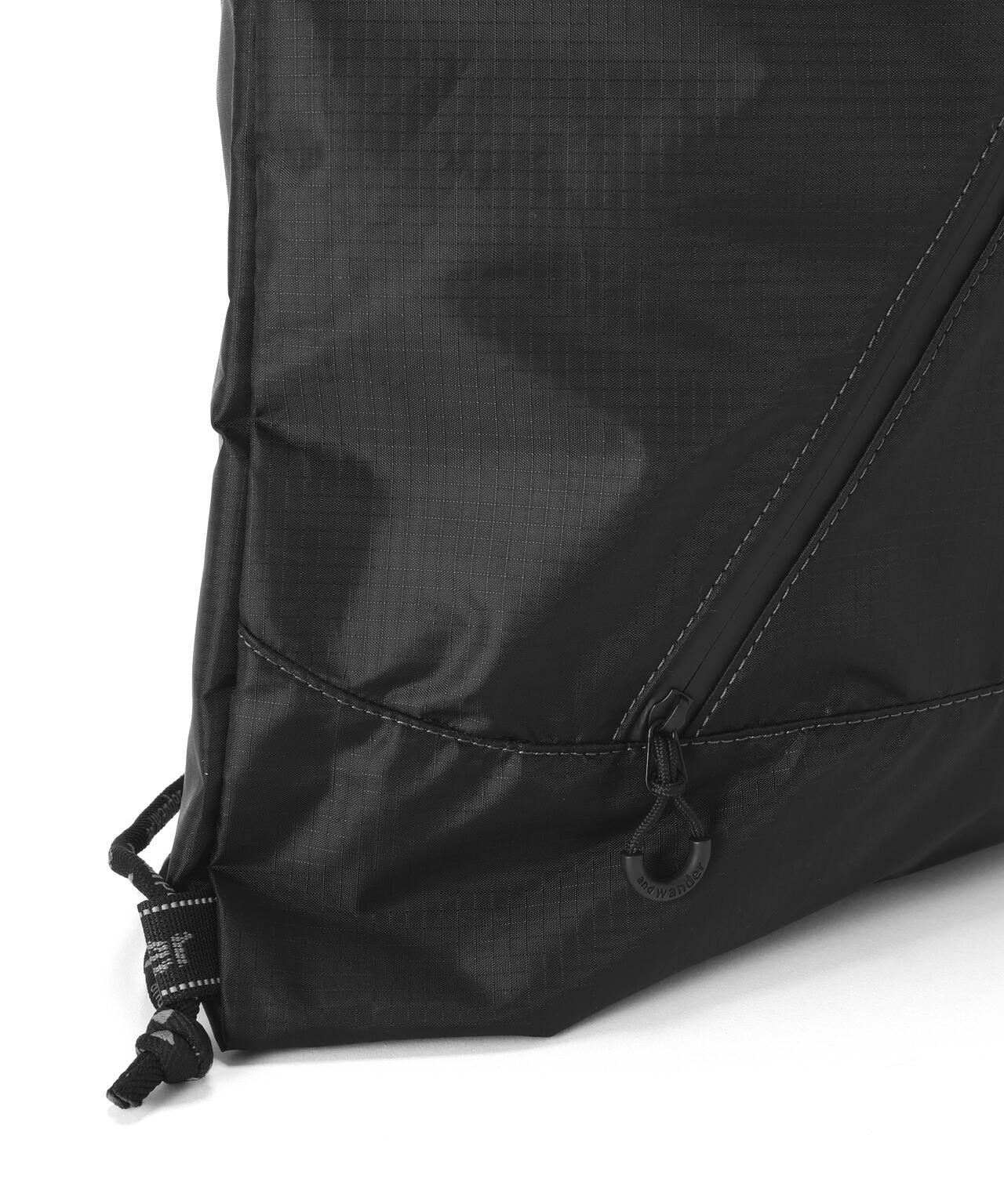 and wander/アンドワンダー crispy rip drawstrung bag ナップサック