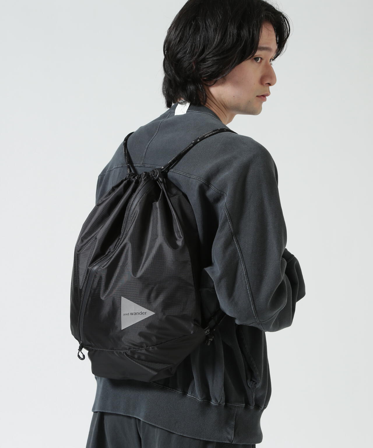 and wander/アンドワンダー crispy rip drawstrung bag ナップサック