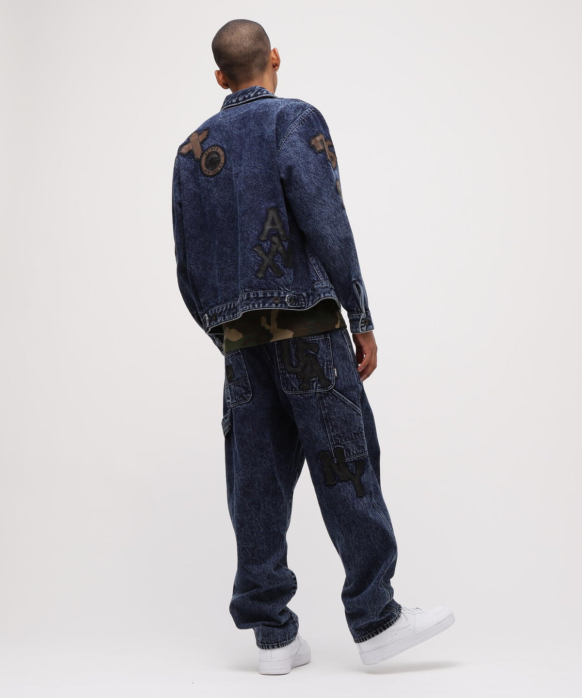 LEATHER PATCH DENIM PANTS