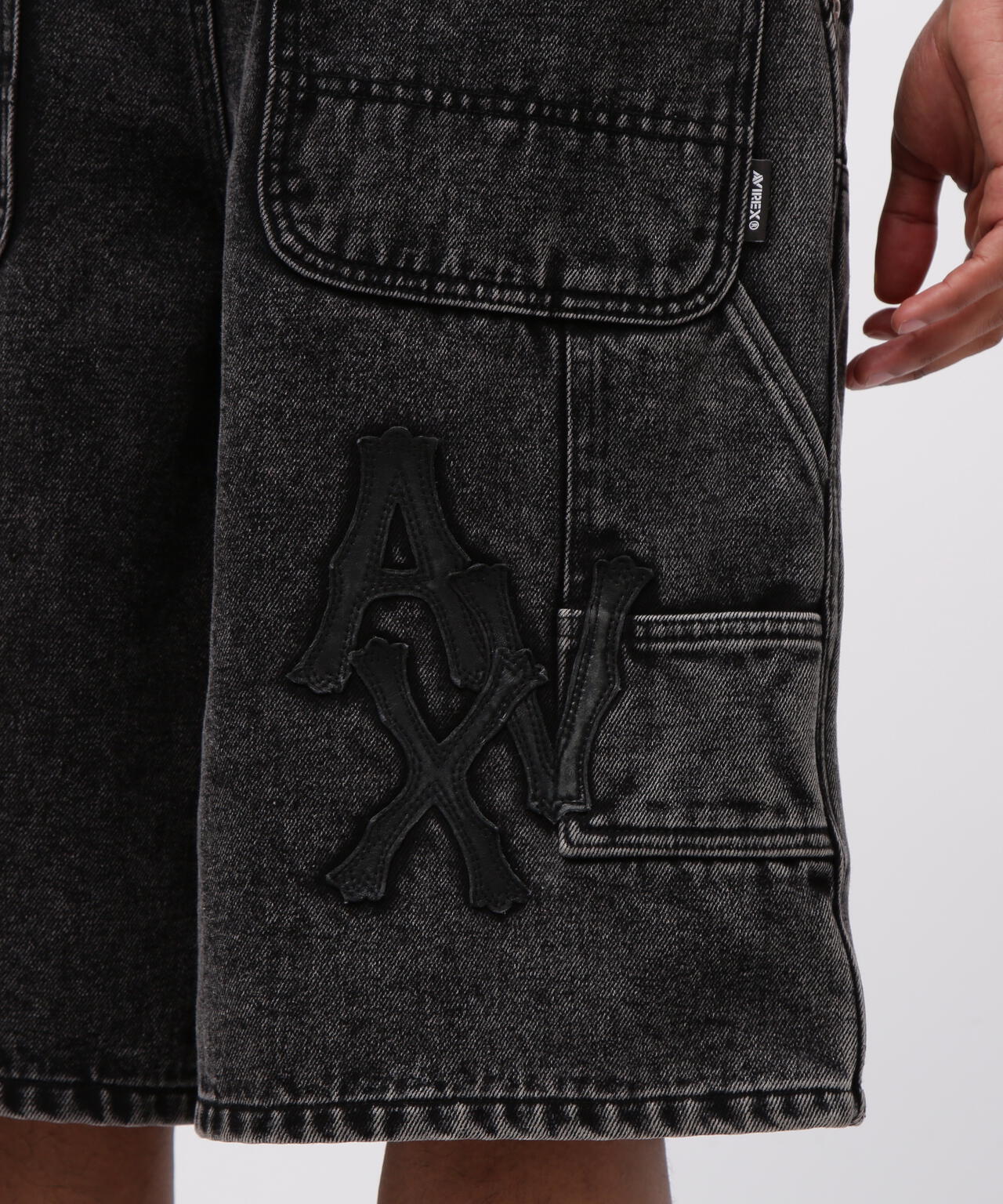 LEATHER PATCH DENIM SHORTS