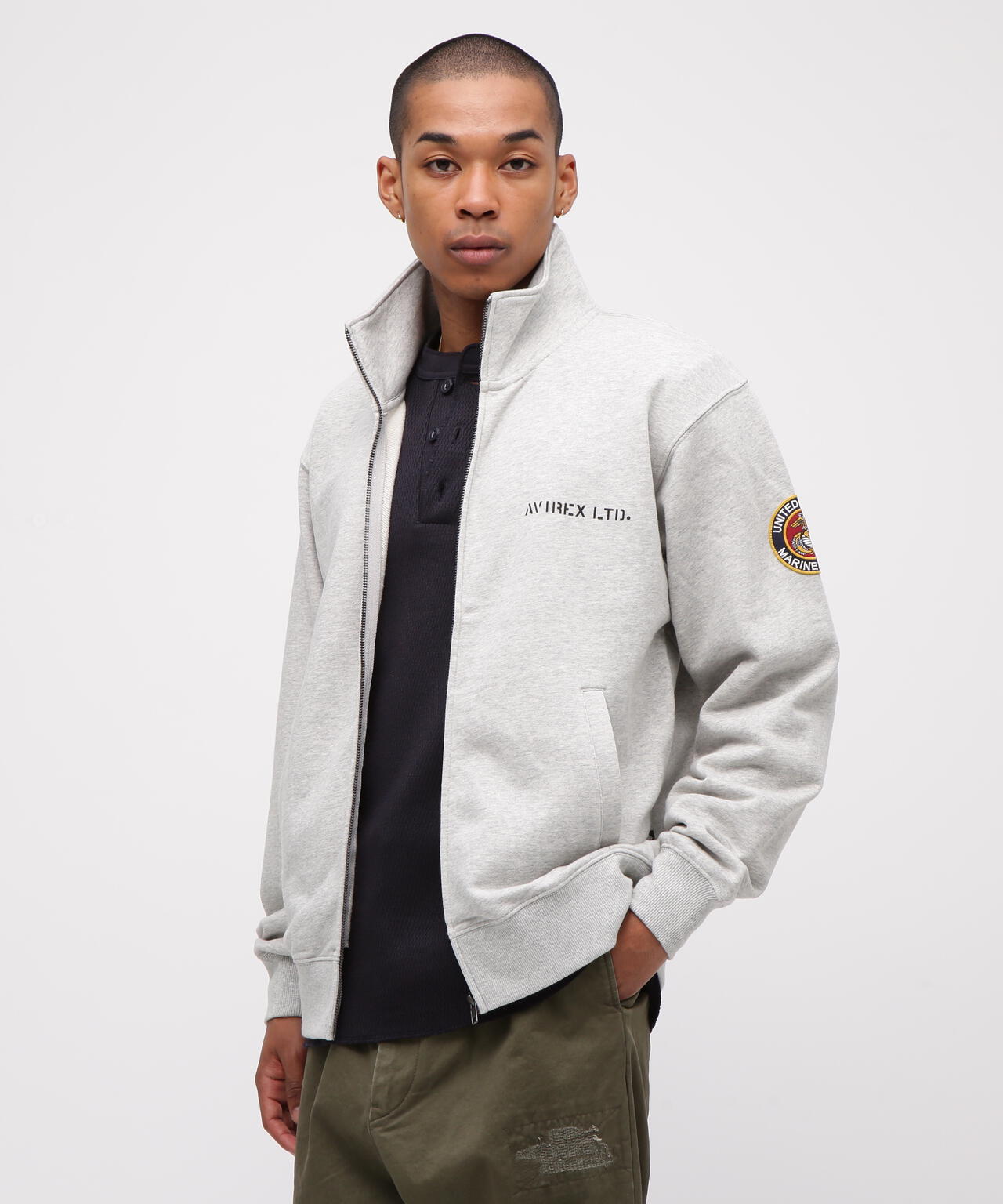 《直営店限定》CAMP LEJEUNE PATCHED STAND ZIP SWEAT