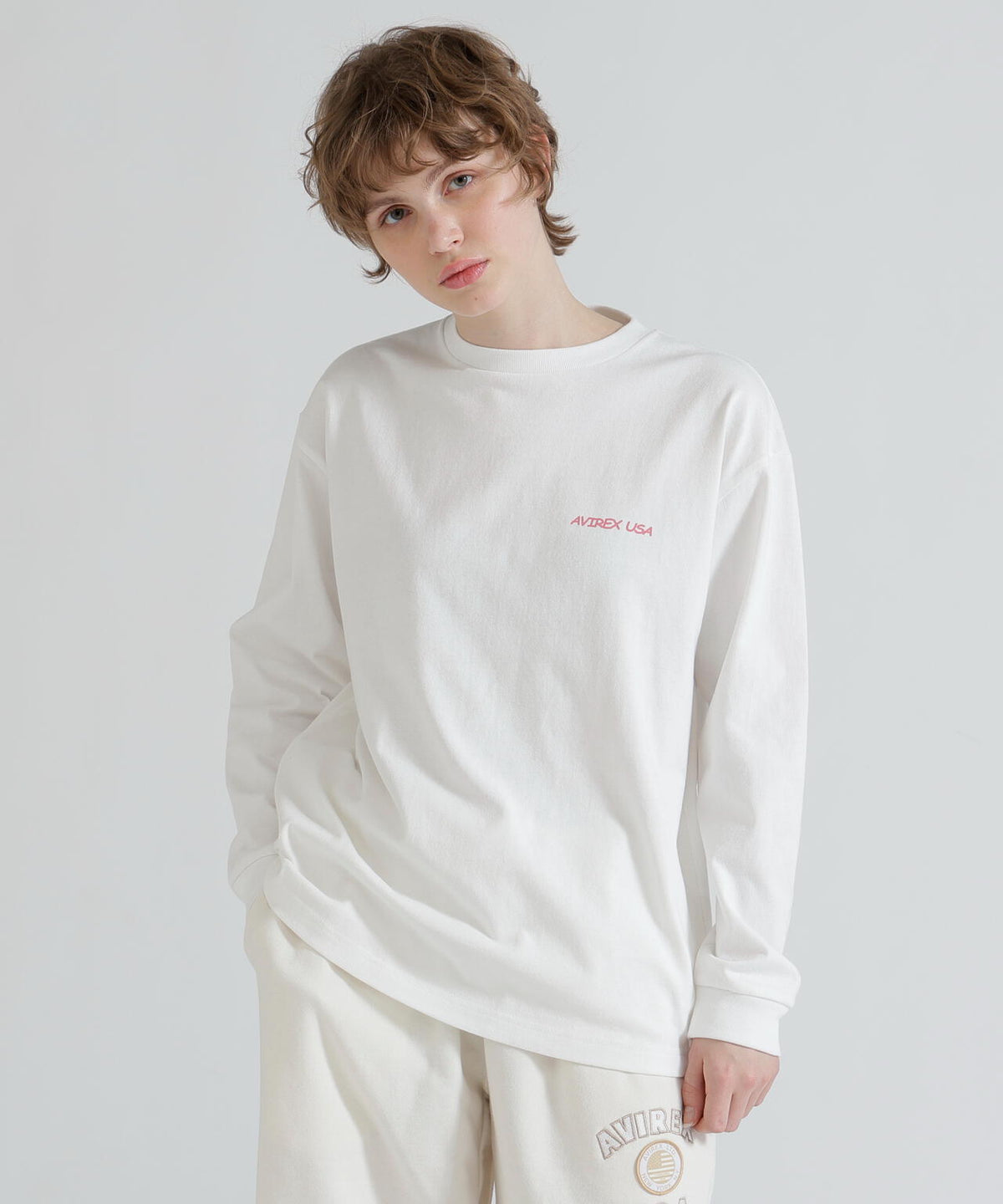 《WOMAN》RANDOM LOGO TOMCAT T-SHIRT