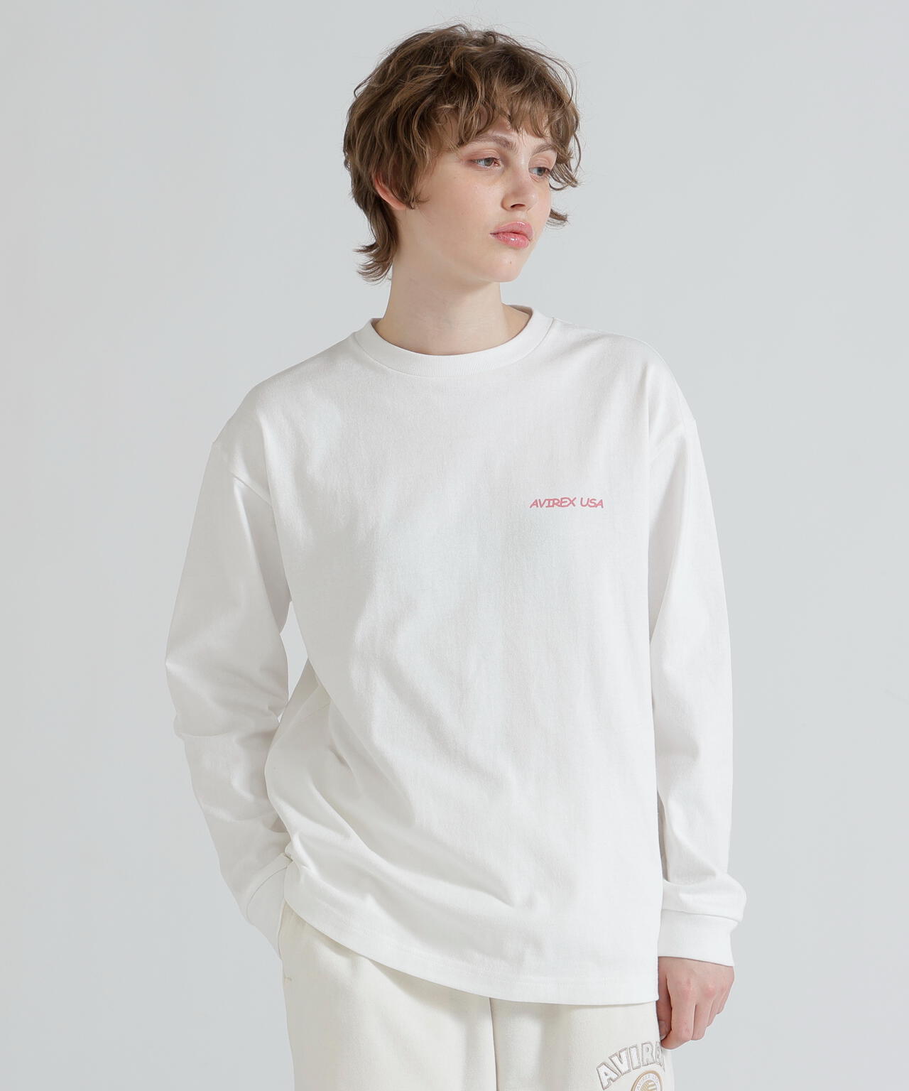 《WOMAN》RANDOM LOGO TOMCAT T-SHIRT
