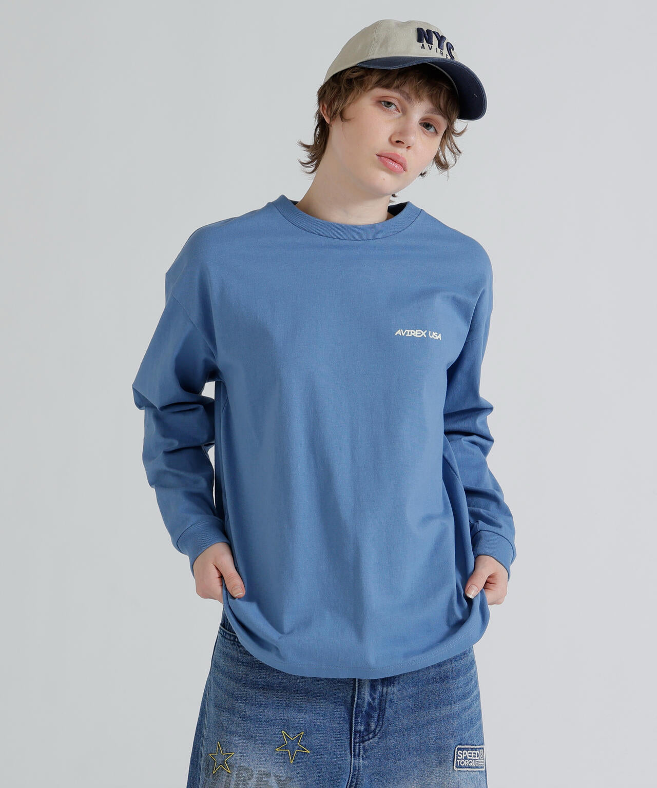 《WOMAN》RANDOM LOGO TOMCAT T-SHIRT