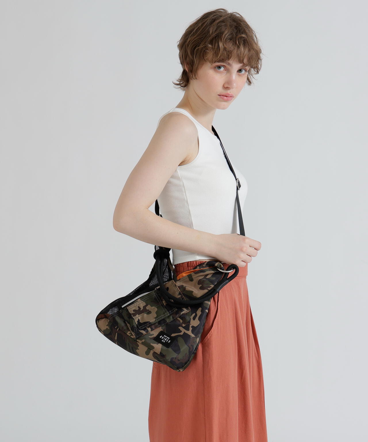 《直営店限定》MINI MESH TRIANGLE BAG