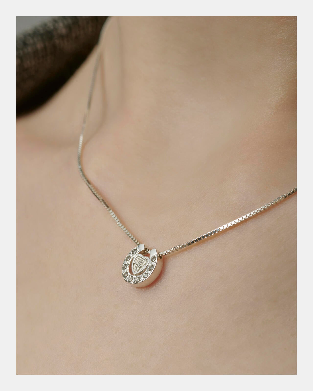 HEART HORSESHOE CZ NECKLACE(SILVER) by J.H.M CO.LTD.