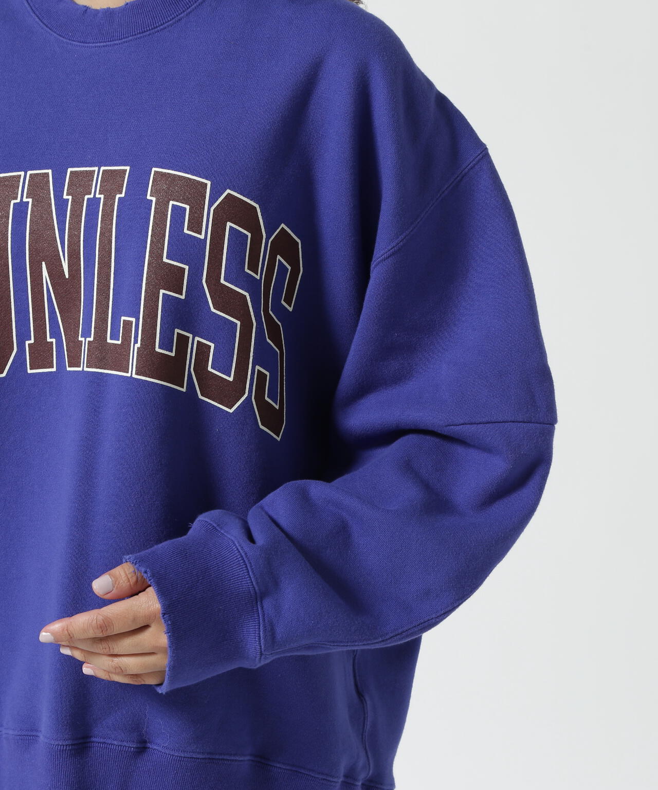 NOUNLESS(ナウンレス)別注COLLEGE LOGO OVER SWEAT