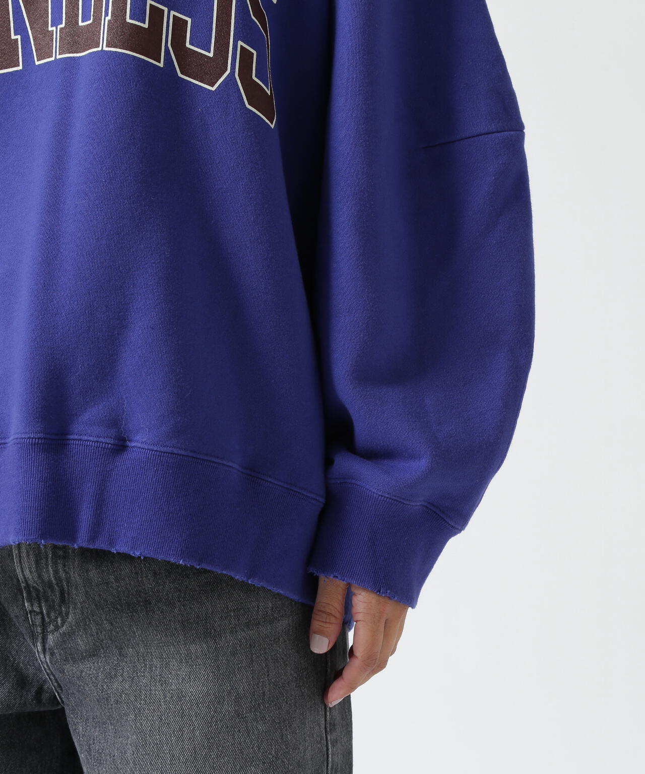 NOUNLESS(ナウンレス)別注COLLEGE LOGO OVER SWEAT