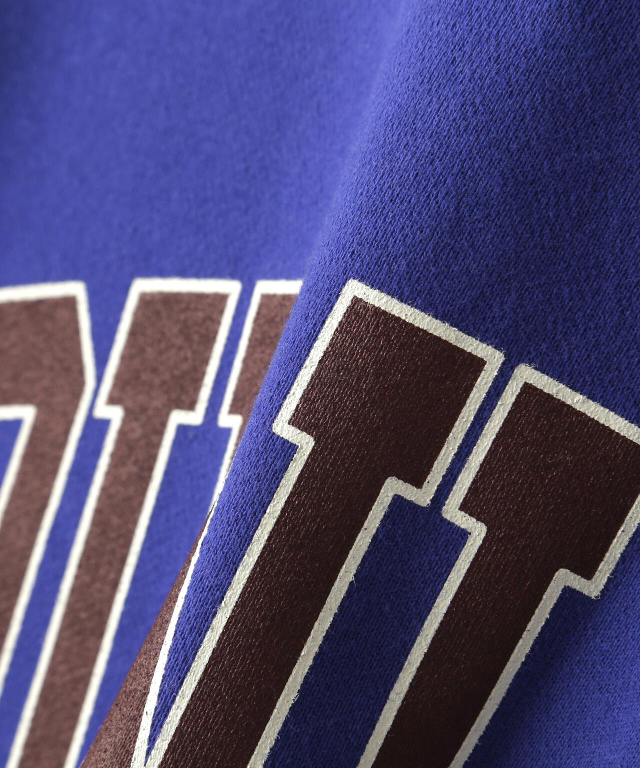 NOUNLESS(ナウンレス)別注COLLEGE LOGO OVER SWEAT