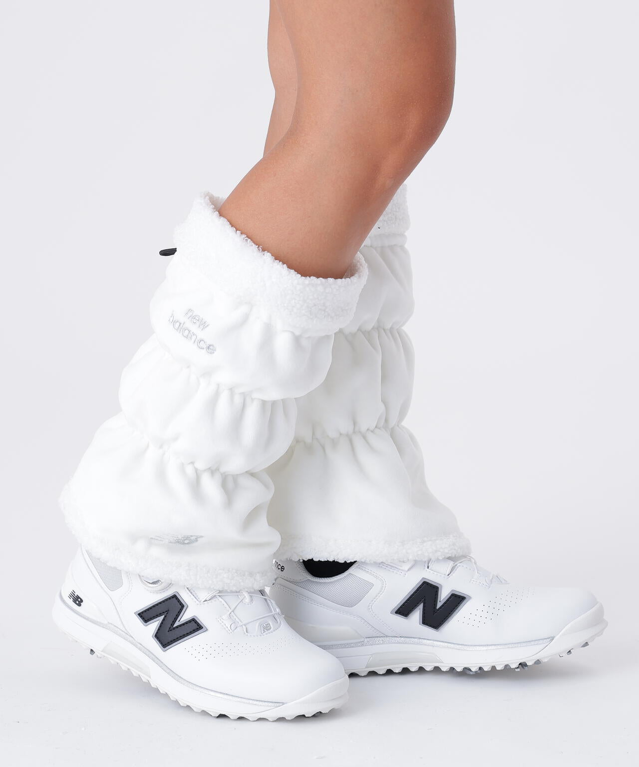 リバーシブル ショート レッグウオーマー (WOMENS) | new balance golf