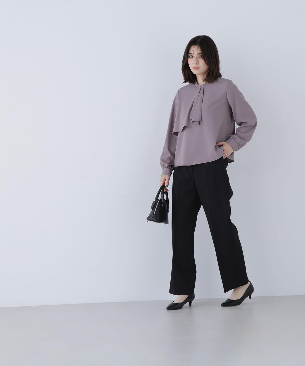 アシメラッフルボウブラウス