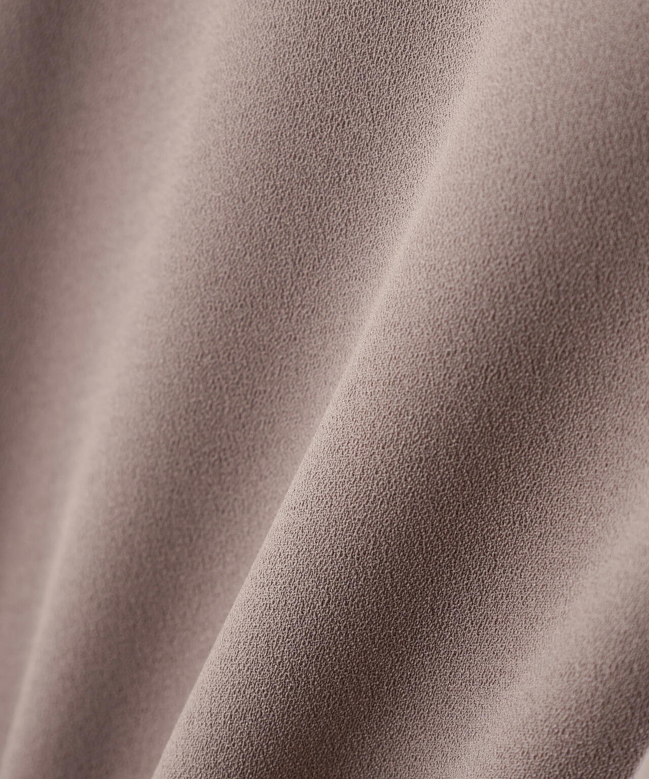 アシメラッフルボウブラウス