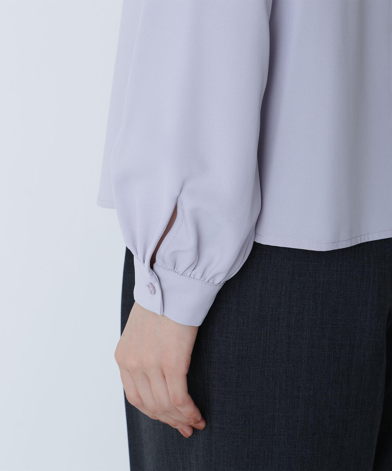 アシメラッフルボウブラウス