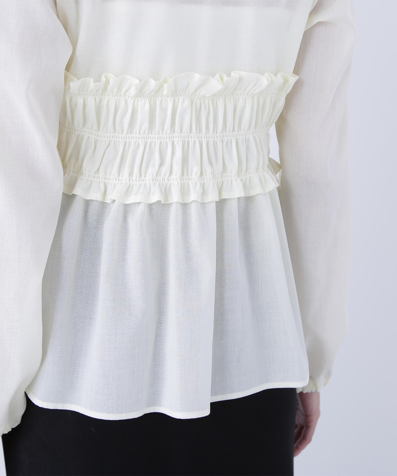 Vネックシャーリングペプラムブラウス