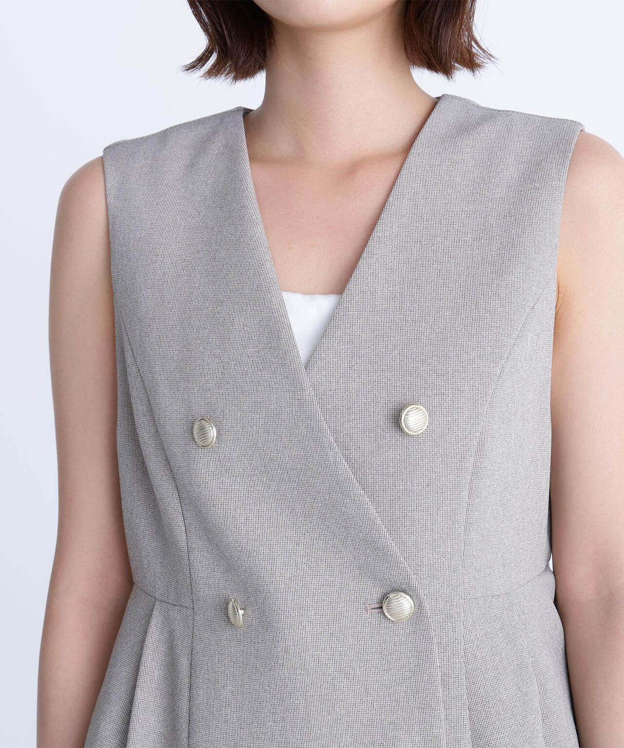 メタルボタンペプラムジレ