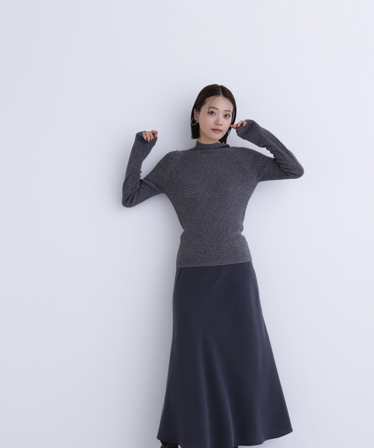 ハイネックラメリブニット