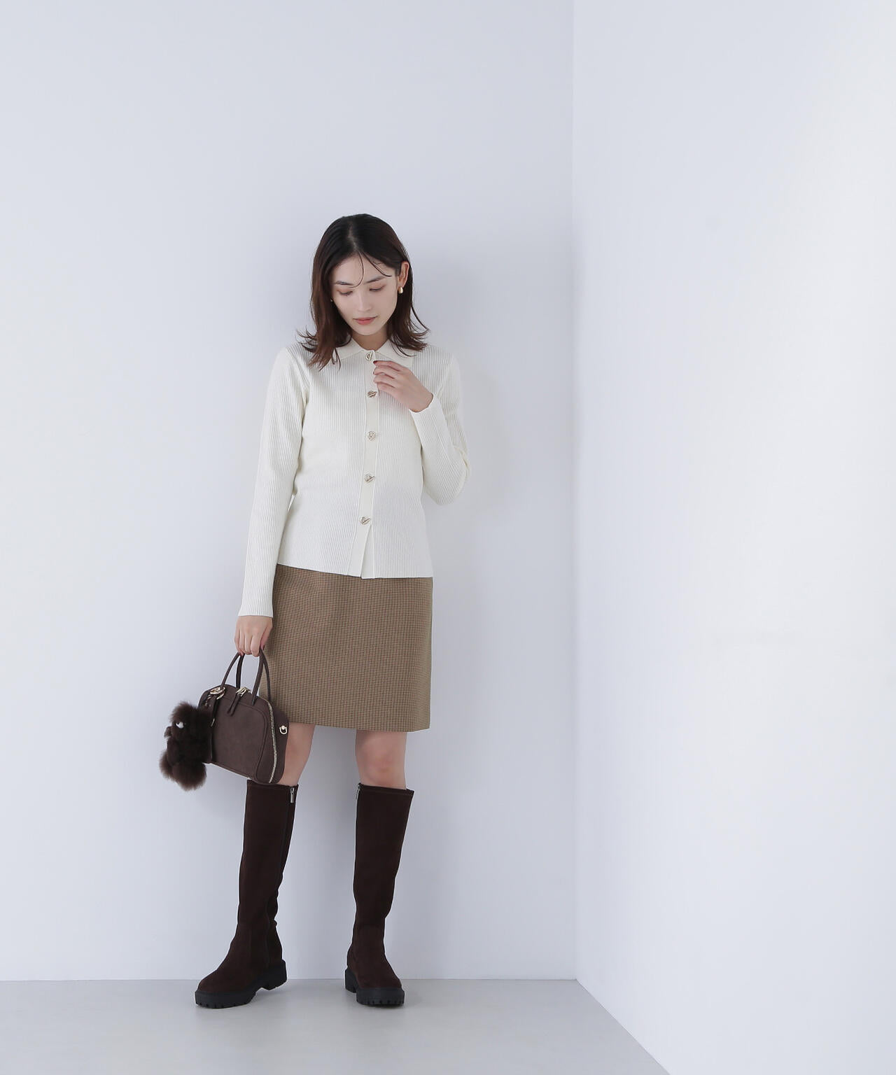 ハトメボタンポロカラーニット