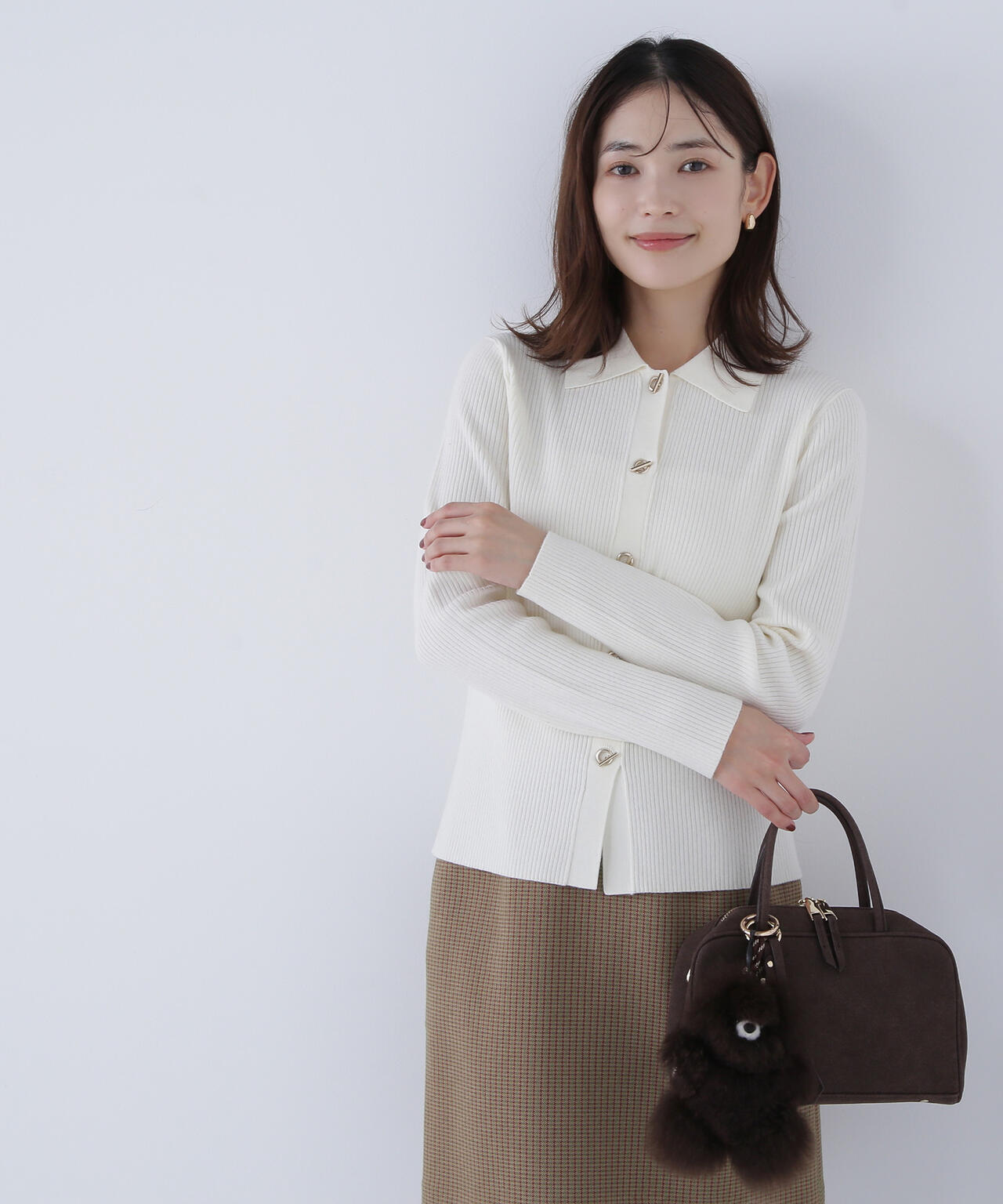 ハトメボタンポロカラーニット