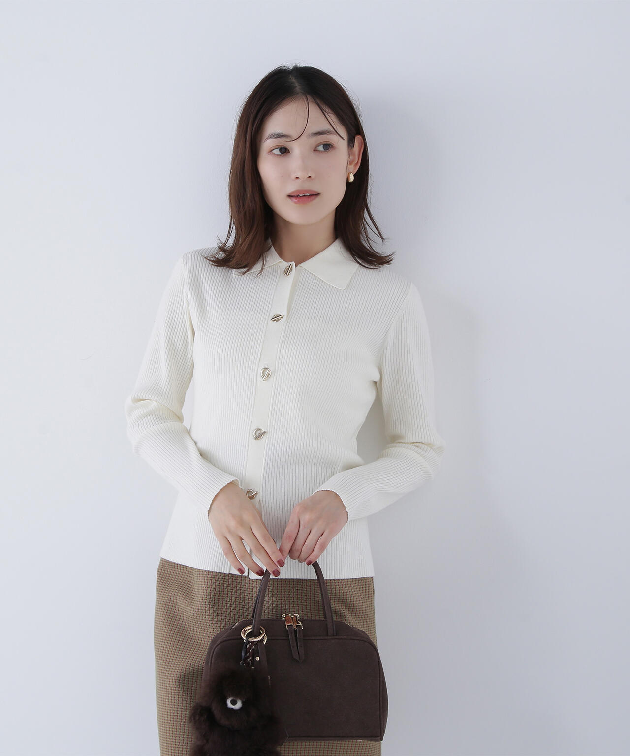 ハトメボタンポロカラーニット