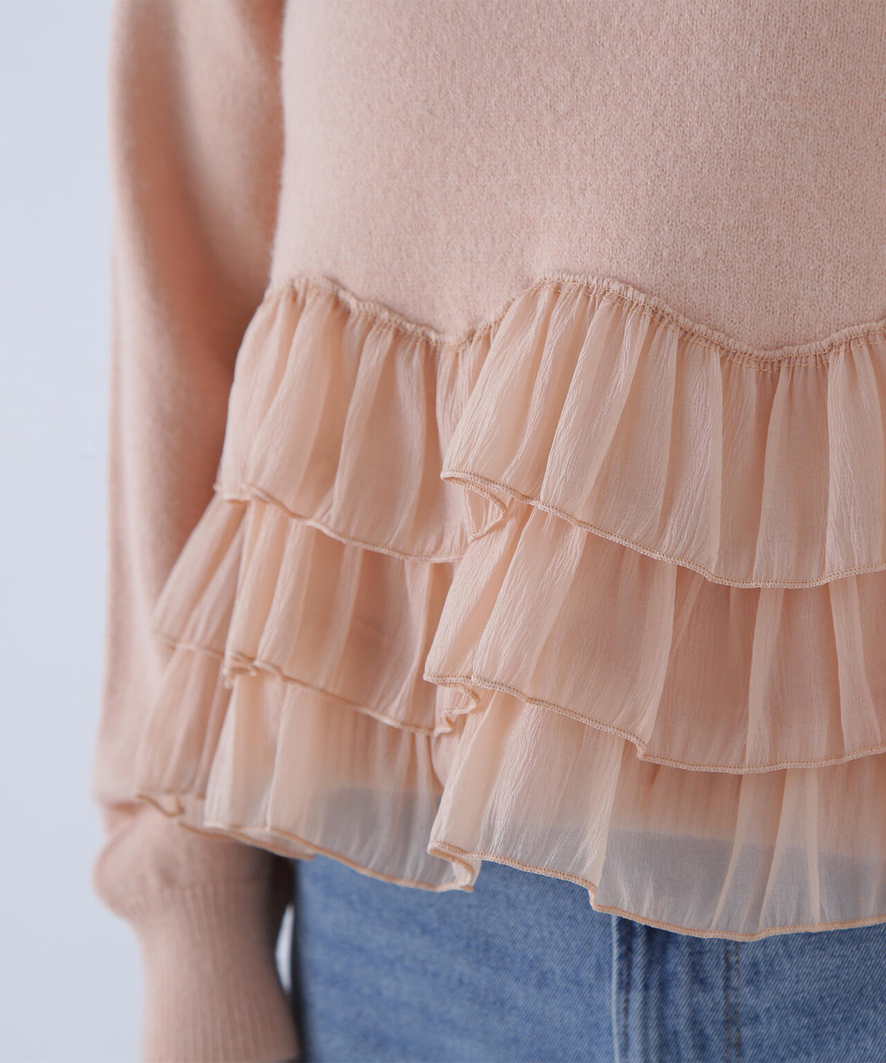 ヘムフリルドッキングニット