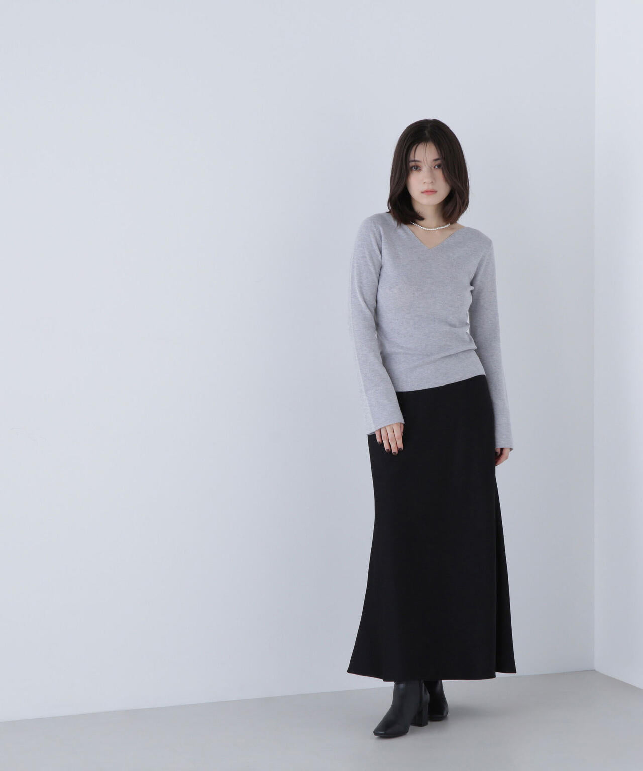 ニュアンスネックフレアスリーブニット