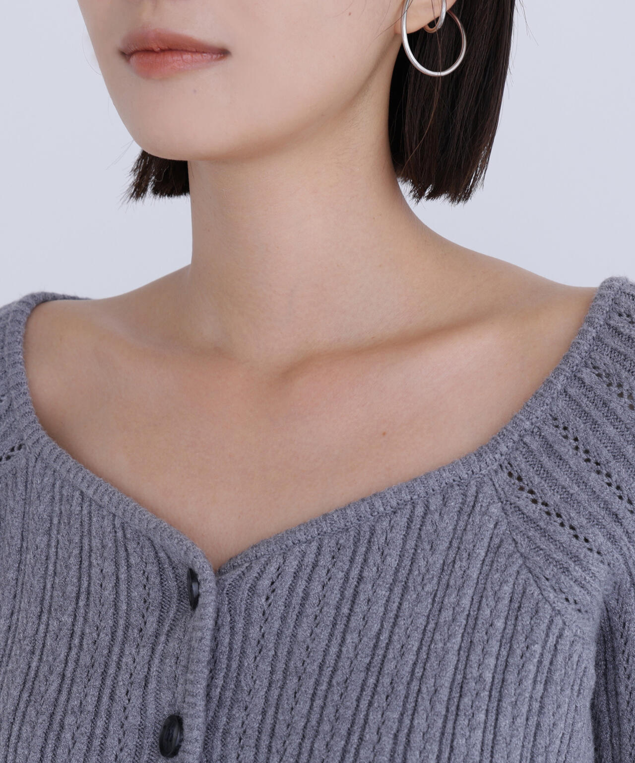 柄編みペプラムニットカーディガン