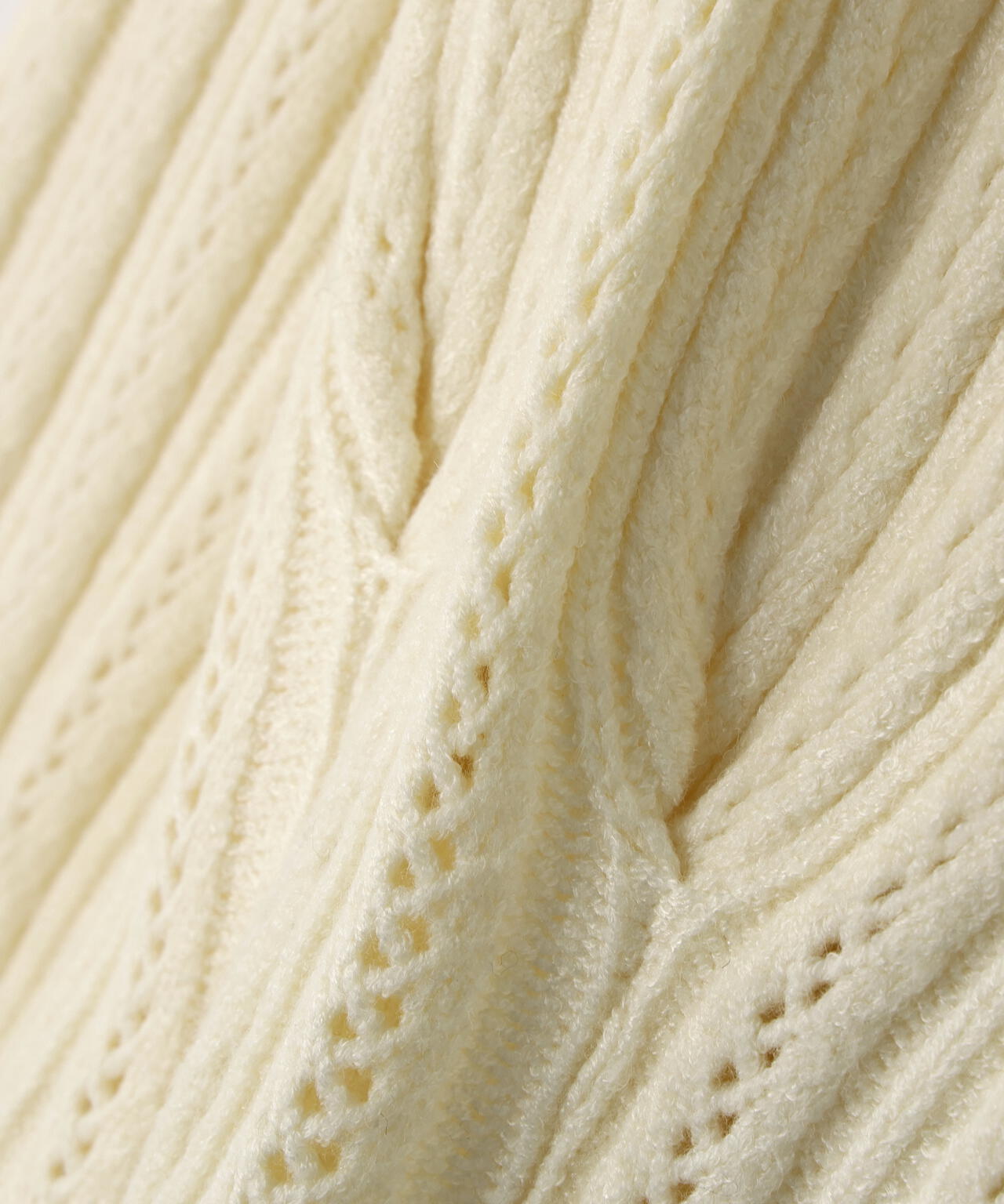 柄編みペプラムニットカーディガン