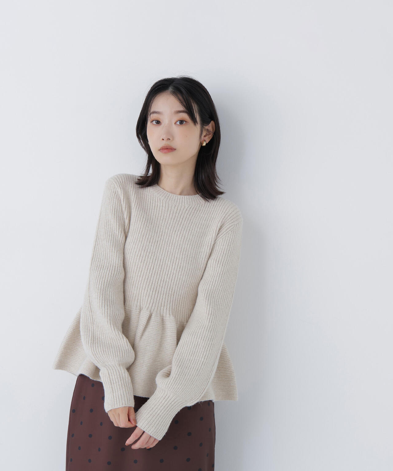 フォルムペプラムニット | NATURAL BEAUTY BASIC（ナチュラル